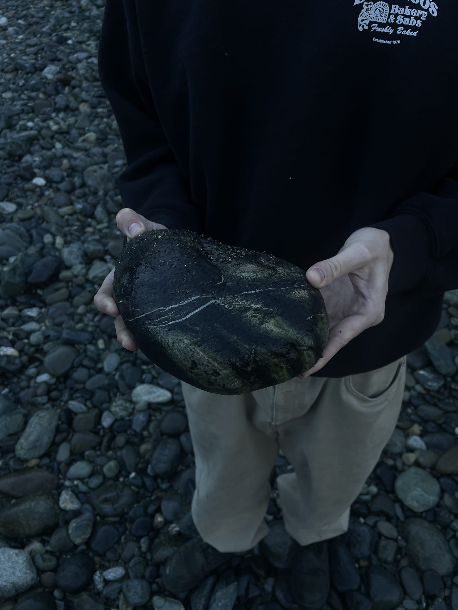 Me holding a rock