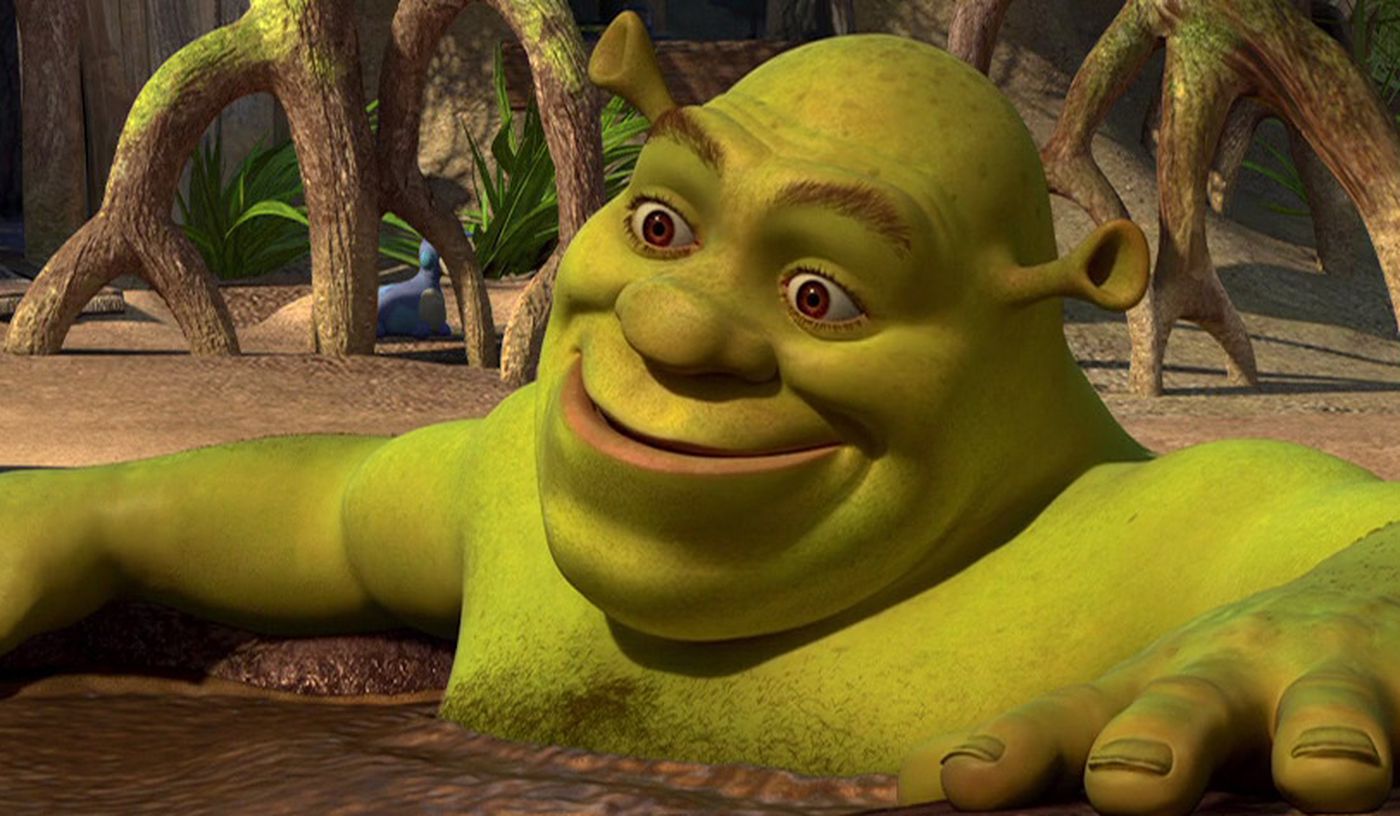 Shrek in a swamp smiling