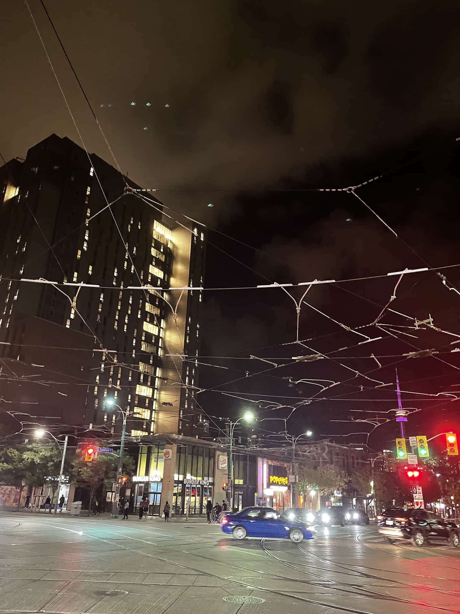 Toronto tram infrastructure.. wires overhead and rails on the ground