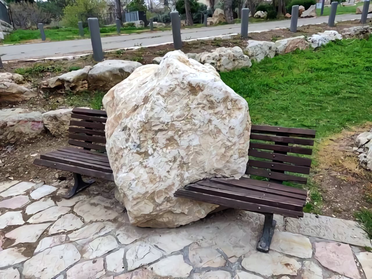 There are rocks. There are benches. This is a rock bench